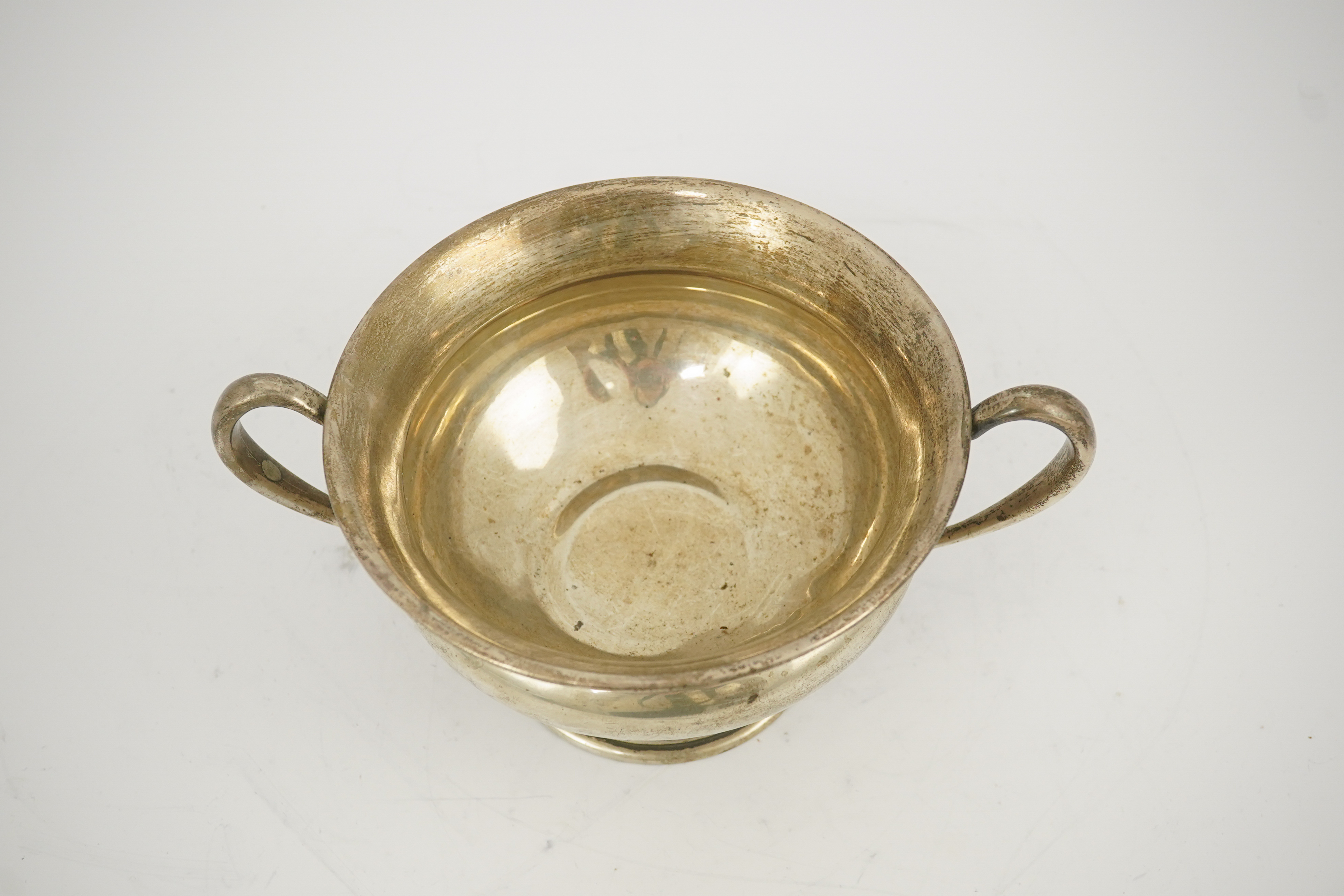 A George V silver two handled pedestal bowl, by Charles Edwards